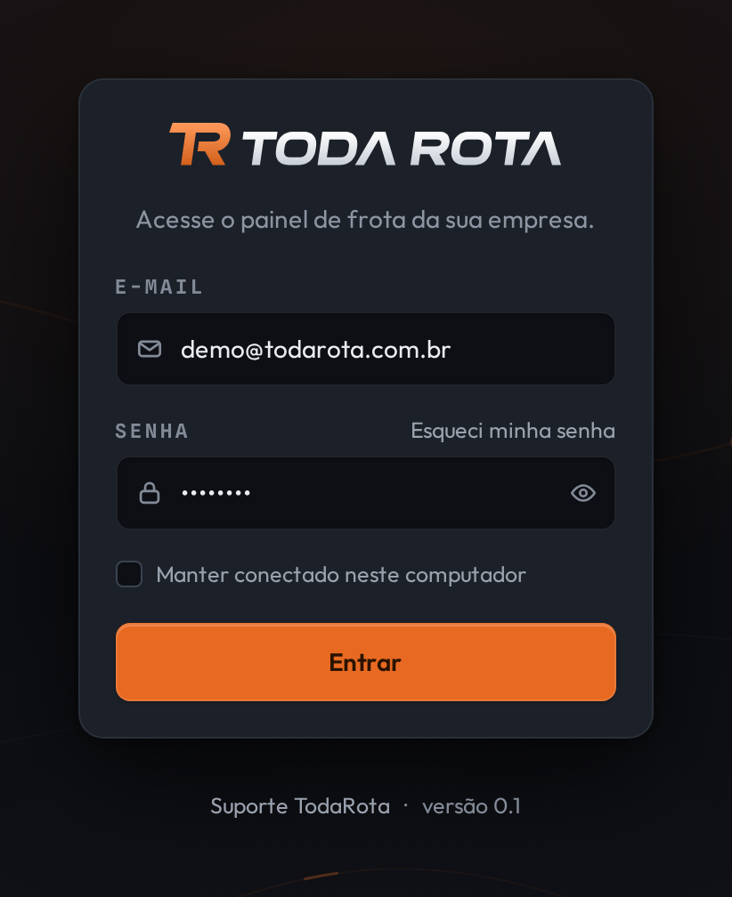 Cartão da tela de entrada do TodaRota, recortado. De cima para baixo: a marca TodaRota, a frase Acesse o painel de frota da sua empresa, o campo E-mail preenchido com demo@todarota.com.br, o campo Senha com a senha oculta e um botão de olho ao lado, o link Esqueci minha senha à direita do rótulo Senha, a caixa Manter conectado neste computador e o botão laranja Entrar. Abaixo do cartão, Suporte TodaRota e versão 0.1.